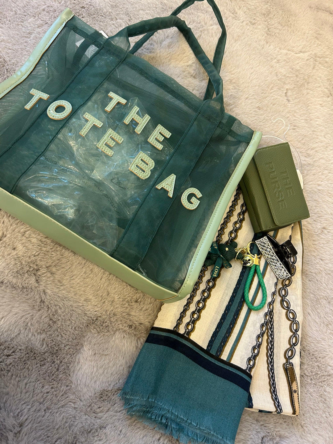 Green themed handbag bundle, with green opaque tote bag, with matching scarf, purse, keyring and hairclip.