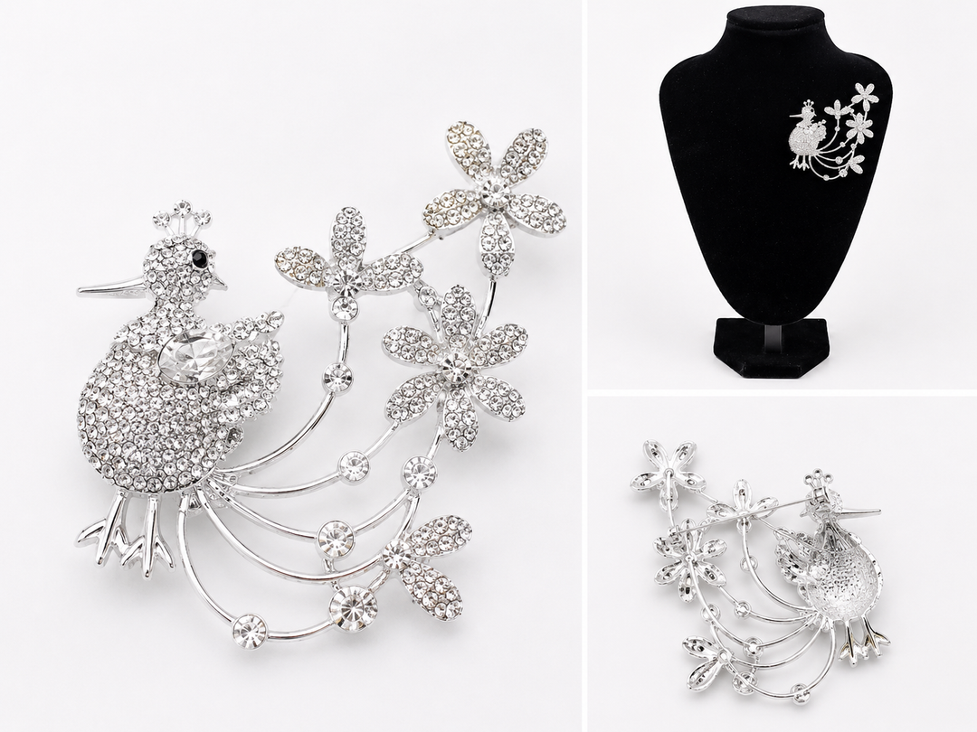 Crystal bird statement brooch with floral detailing available in rose gold, gold and silver