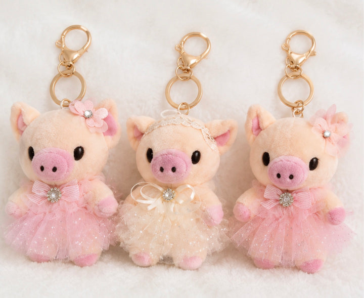 Soft plush pig princess keyring charm with glitter tulle dress, gold clip and key ring 