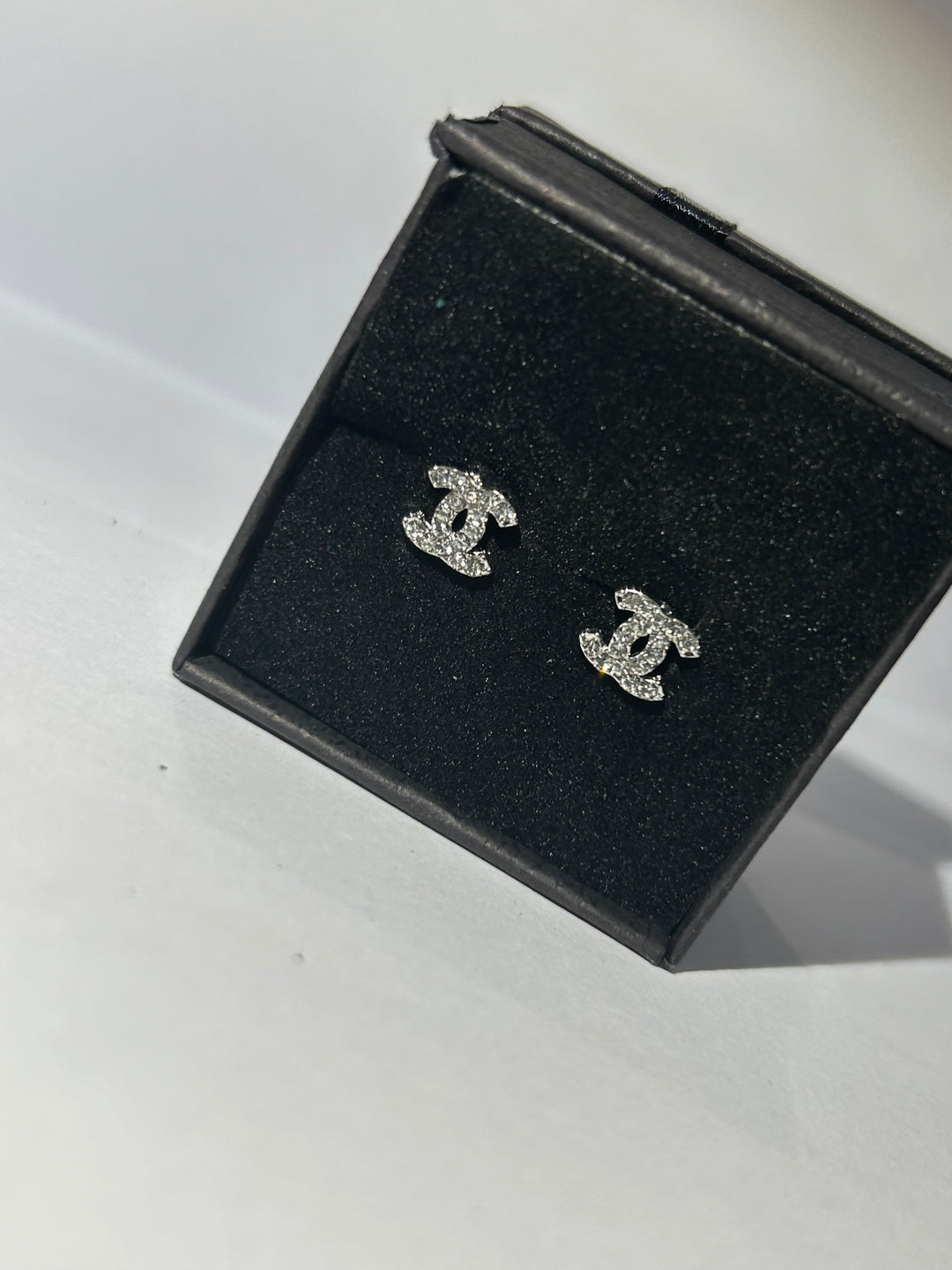 Letter c earrings with crystal detail