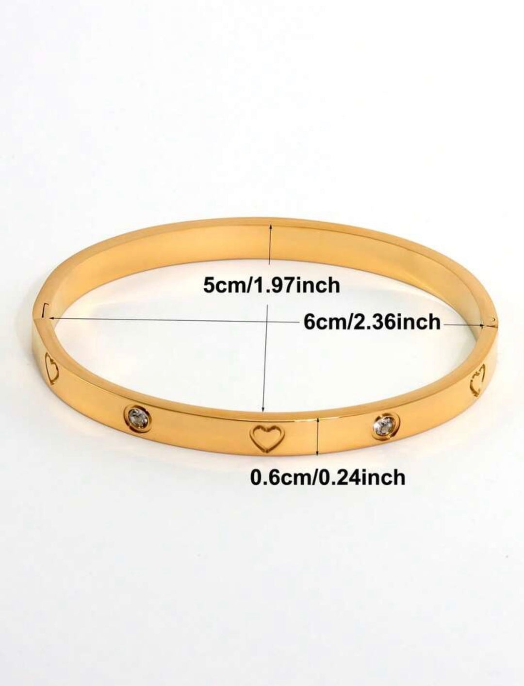     Gold three-piece stainless steel love bangle bracelet set with heart charms and crystal detailing.