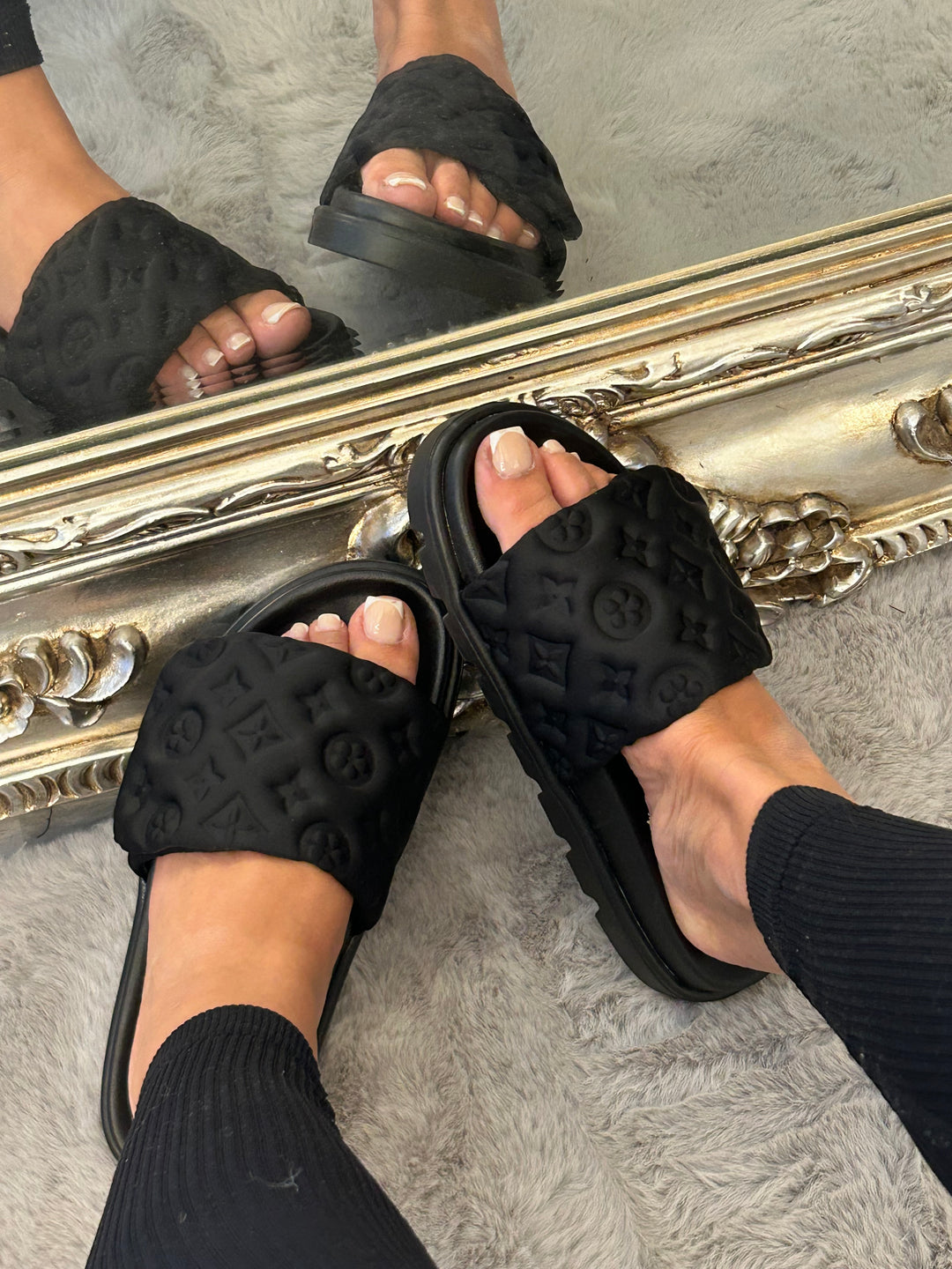 Black textured quilted slider sandals 