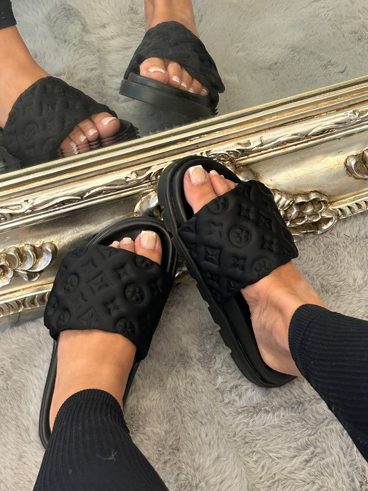 Black textured quilted slider sandals 