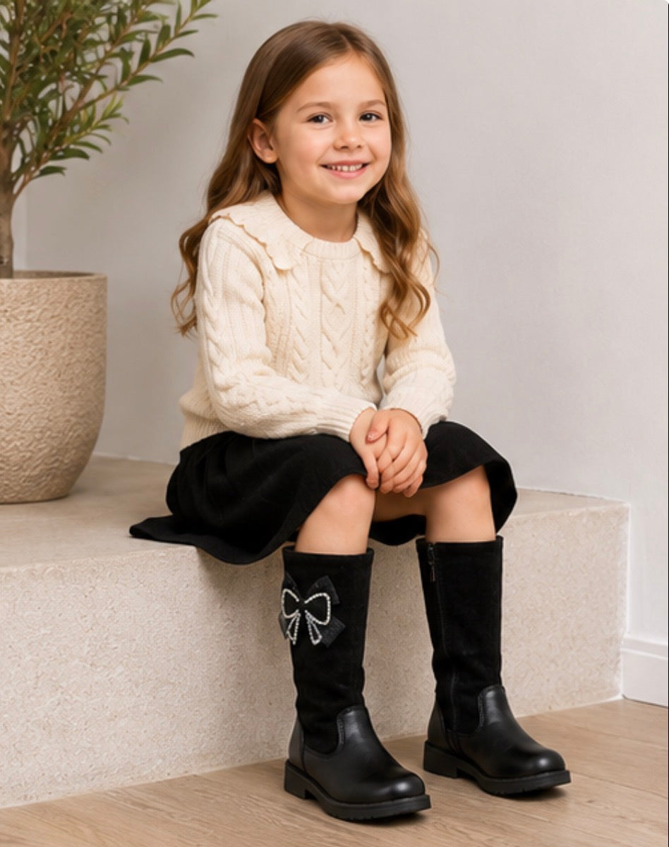 Black girls knee high boots with diamanté bow detail, chunky sole and soft suede style finish