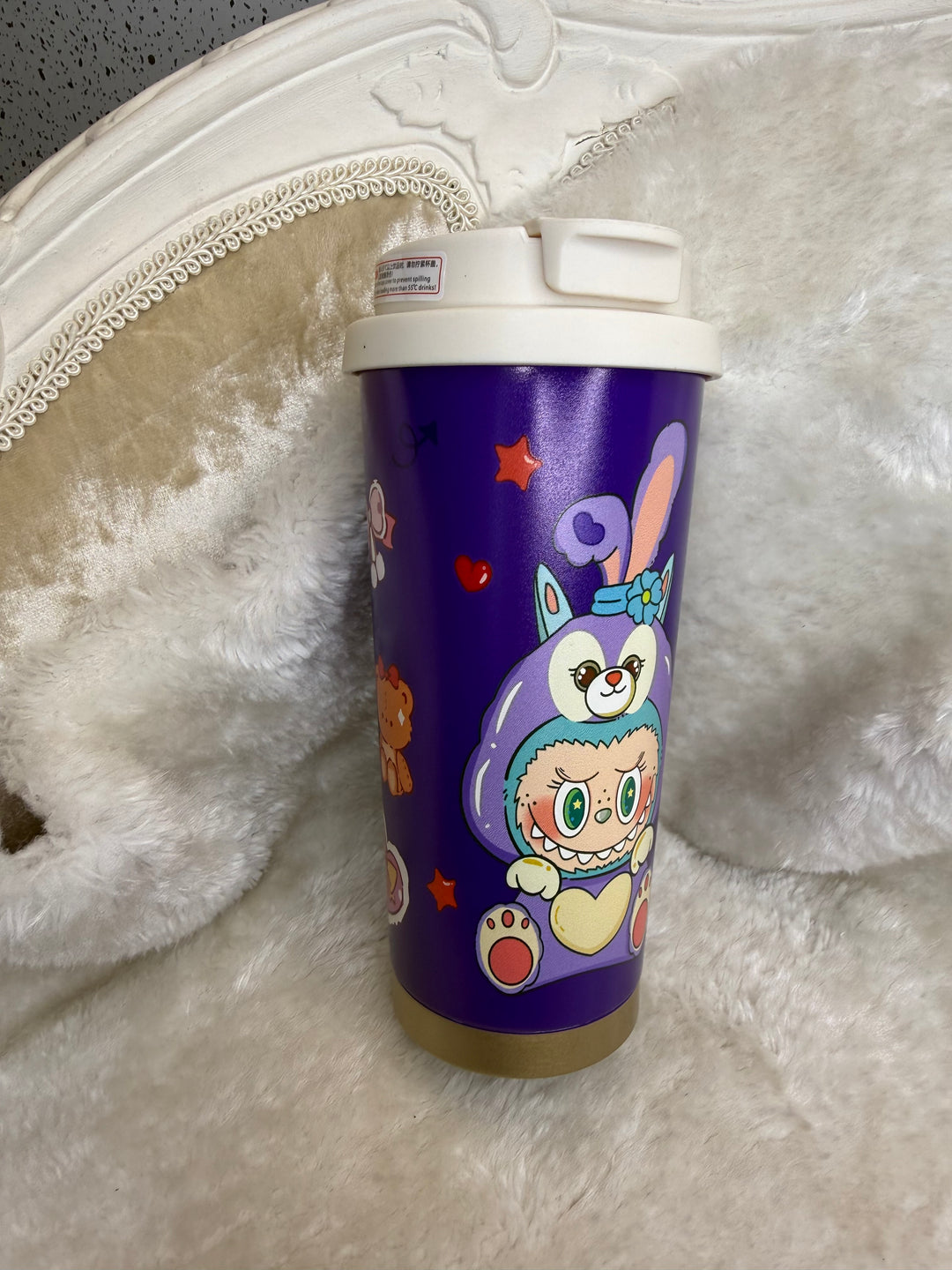 Colourful cartoon-themed tumbler