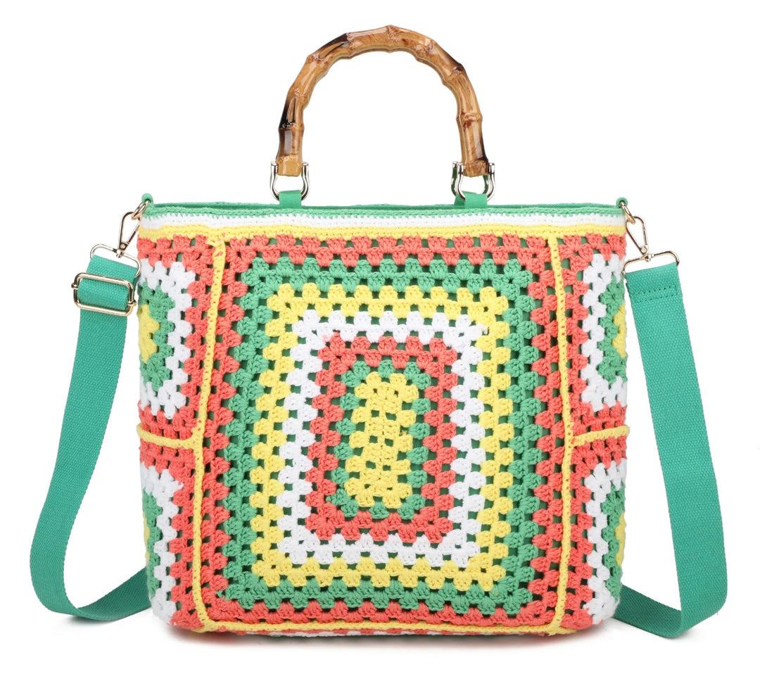Green based crochet grab bags with bamboo handles and a top zip closure