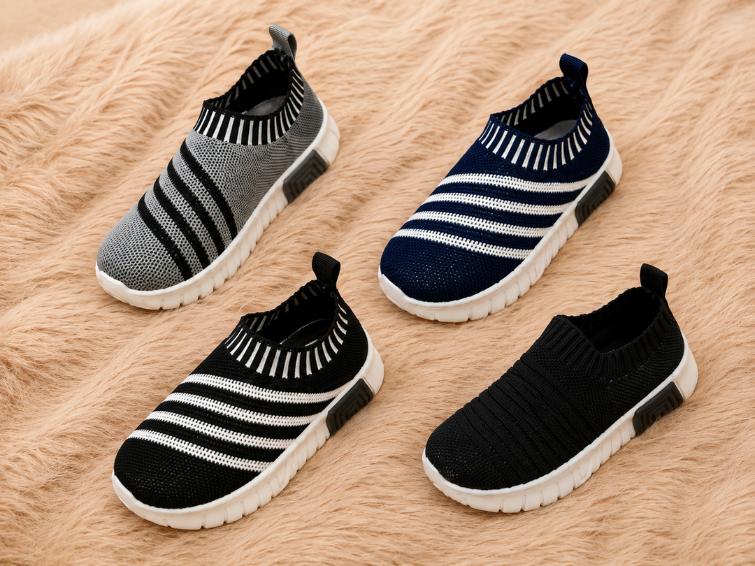 slip-on trainers in grey and black, navy and white, black and white, and plain black designs with lightweight flexible soles.