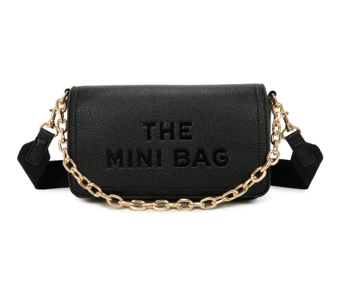 A black mini tote bag with a chain detail and the text &