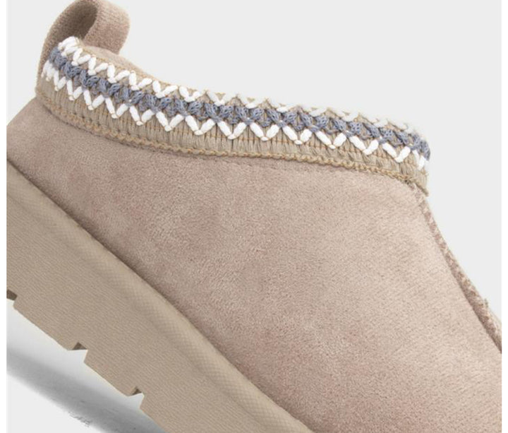 Beige suede slip-on mule slippers with thick sole and zigzag woven trim detail