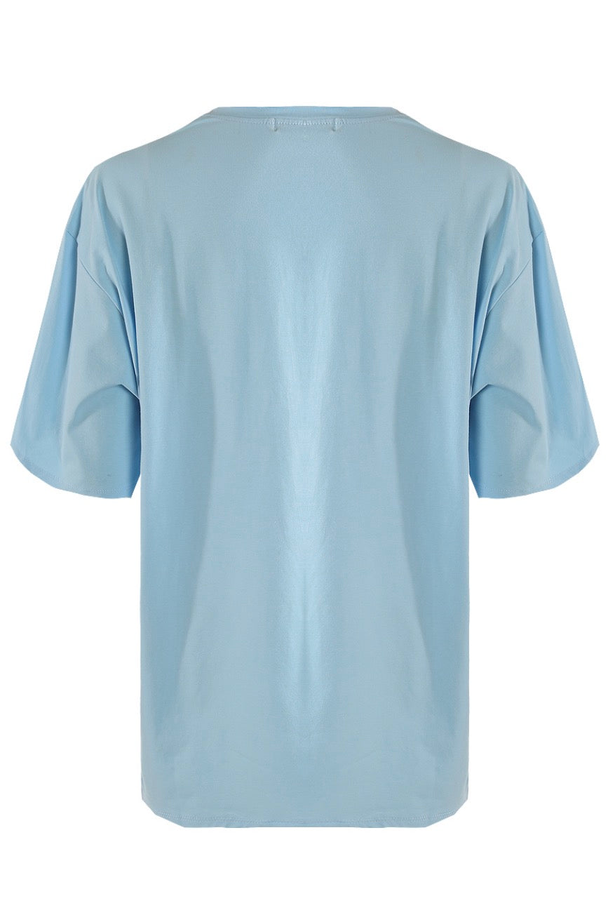     Back view of plain blue oversized t-shirt