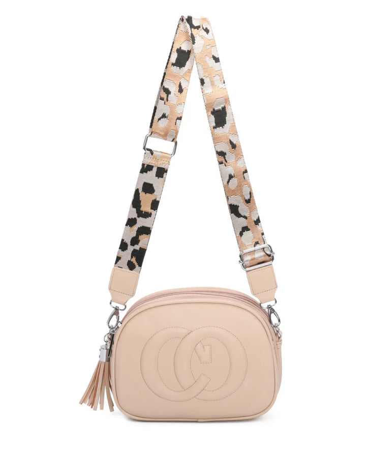 A animal patterned strap cross body bag with a detachable and adjustable strap, featuring multiple zipped compartments and golden tone metal hardware.