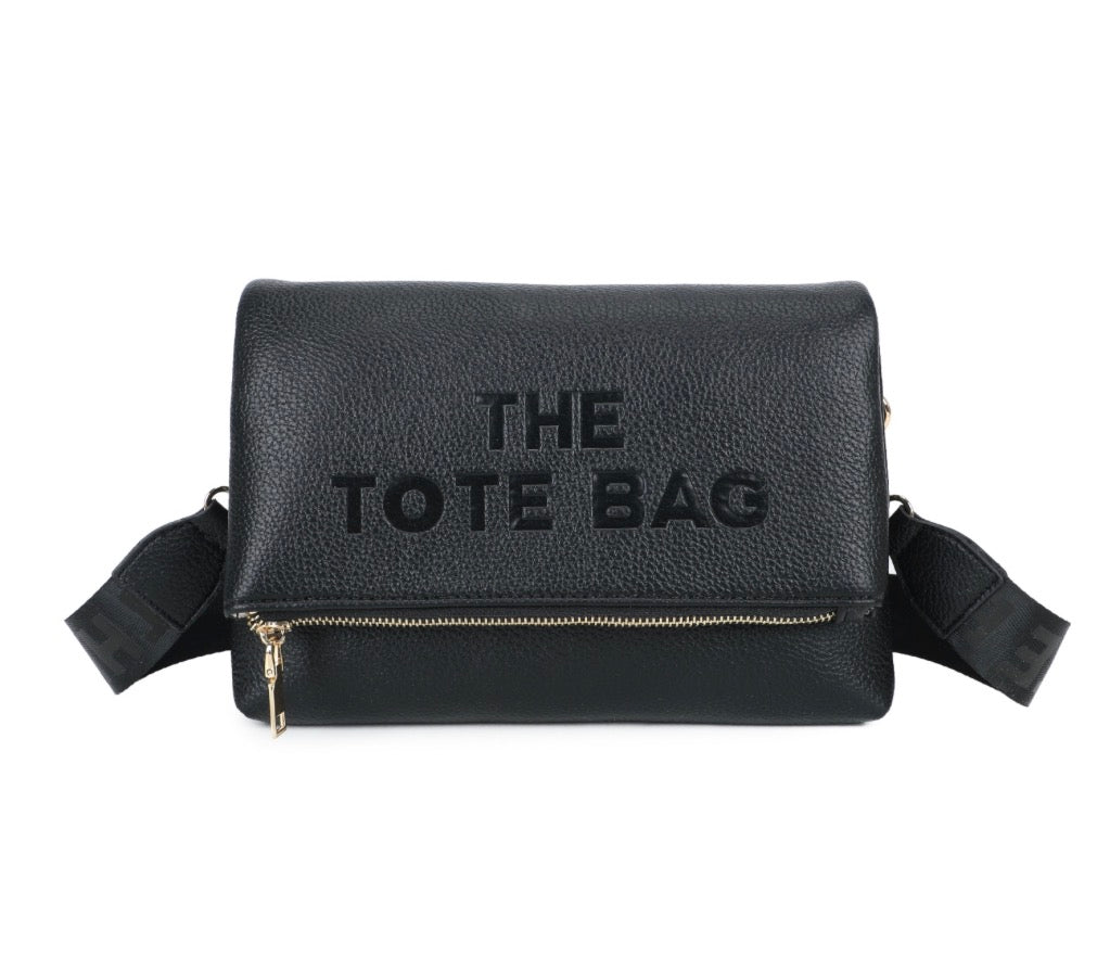Black medium crossbody tote bag with flap closure and adjustable strap
