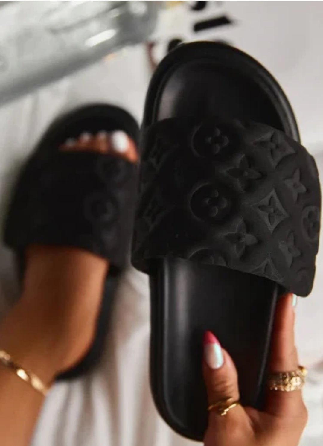 Black textured quilted slider sandals 