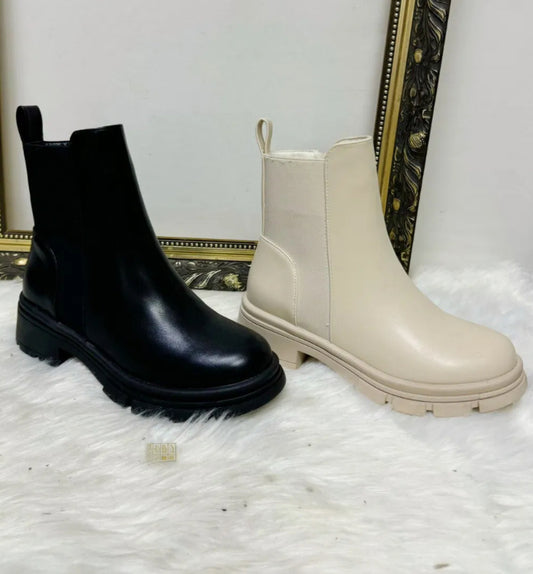 Black or cream ankle boots