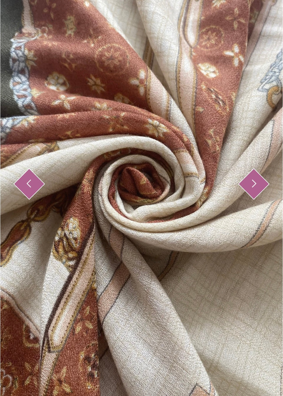 A scarf with a belt buckle print, featuring a variety of colors including beige, brown, and grey.