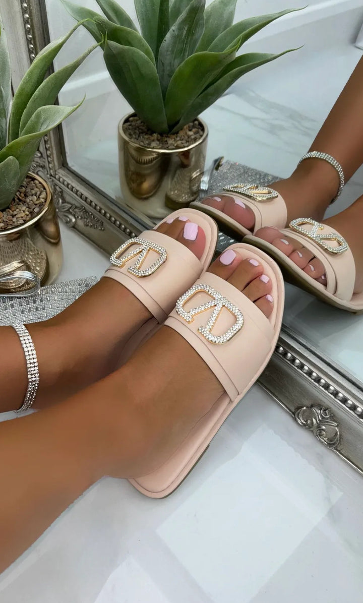 Beige slip-on shoe slider with silver rhinestone embellishment 