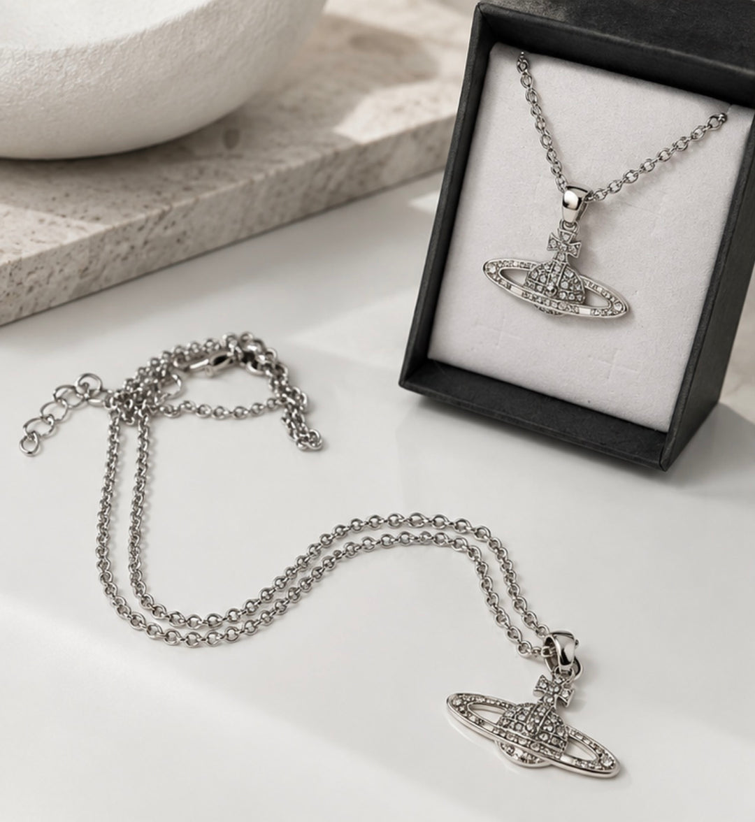 Silver crystal embellished orb pendant necklace with silver-tone chain