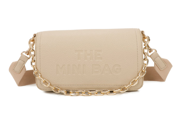 A beige mini tote bag with a chain detail and the text &