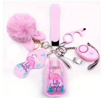 Pink keychain with various charms