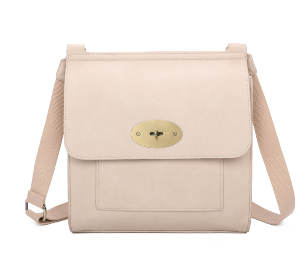 Beige satchel bag with gold hard wear detailing and a long strap 