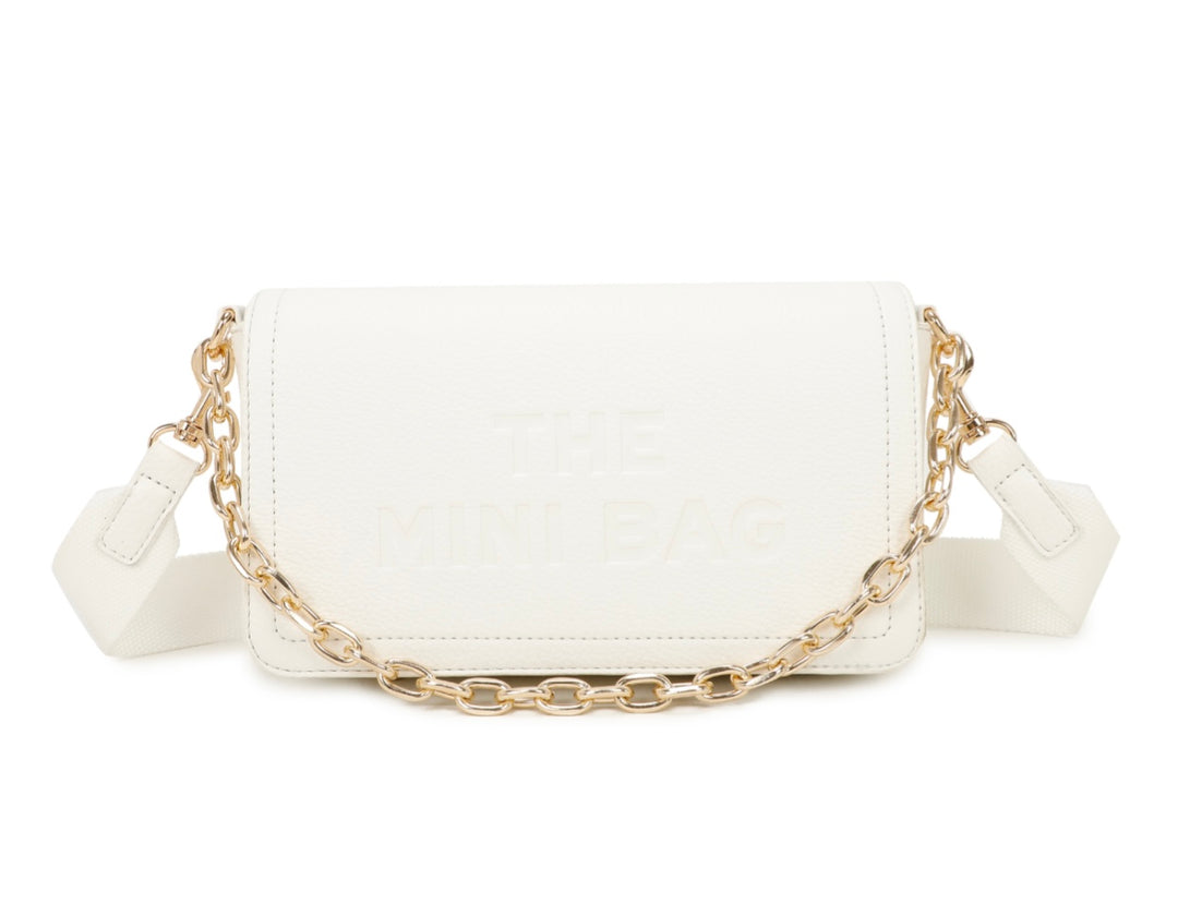 A white mini tote bag with a chain detail and the text &