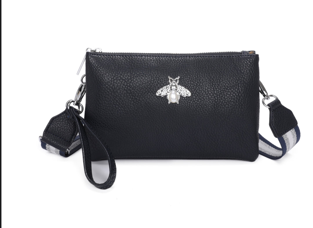 Black handbag with a bee emblem 