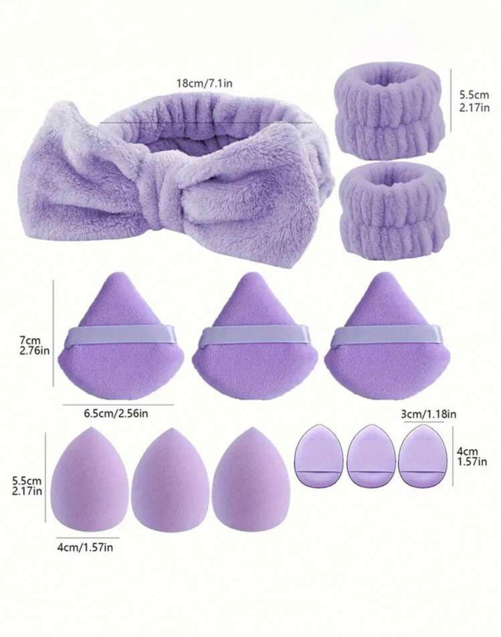 Purple plush beauty set including a bow headband, two small hair ties, three teardrop sponge shapes, and two smaller teardrop sponge shapes, with size measurements labeled on a white background.