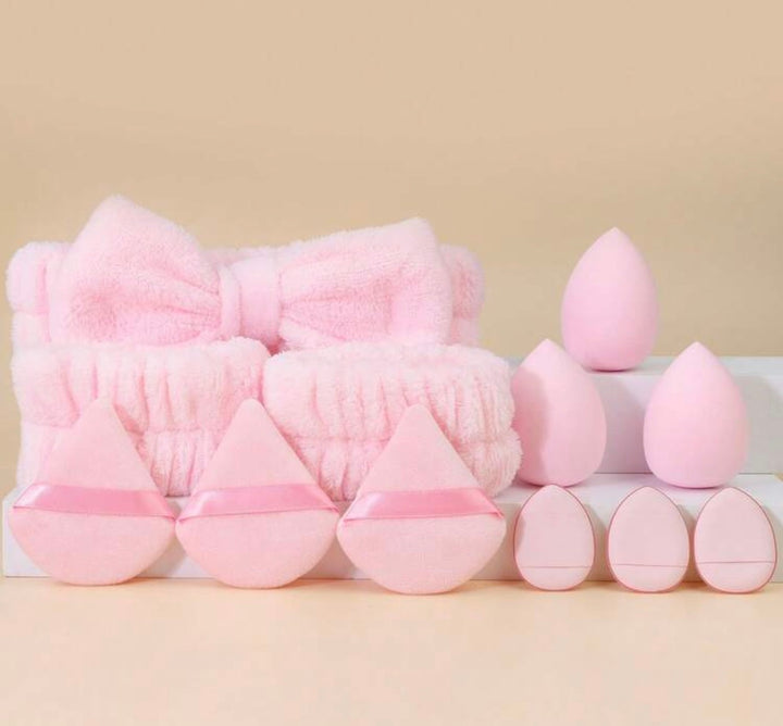 Luxury pink makeup sponge and spa accessory gift set including beauty blenders, powder puffs, spa headband and wrist washbands.