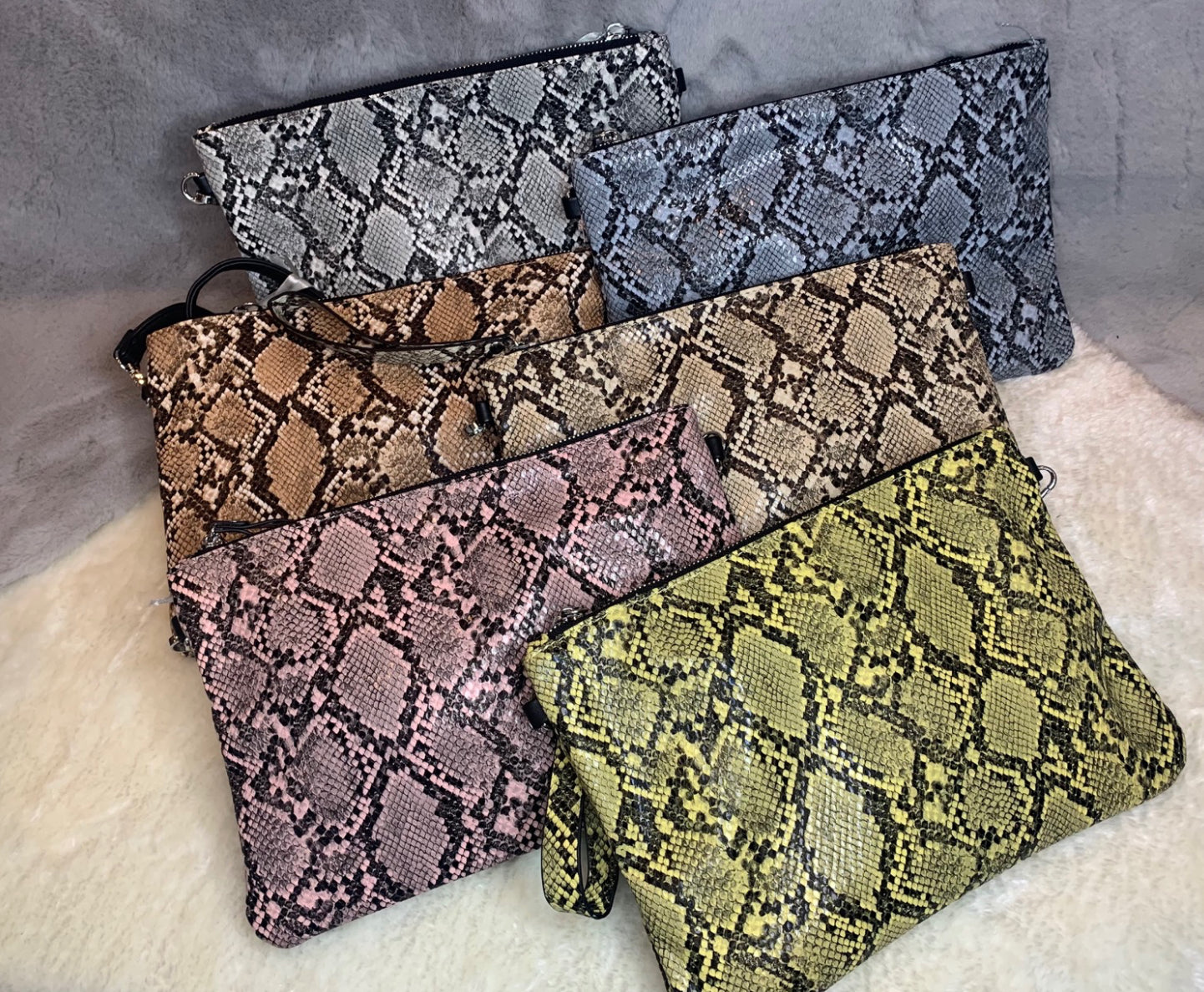 Snake print Clutch bag