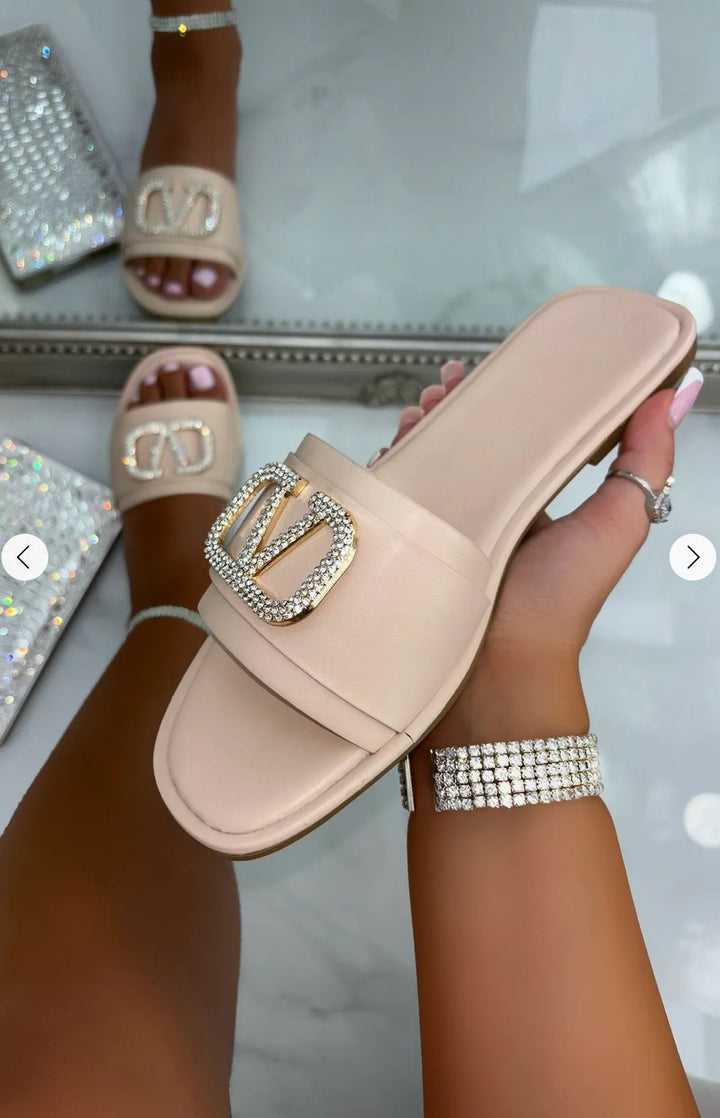 Beige slip-on shoe slider with silver rhinestone embellishment 