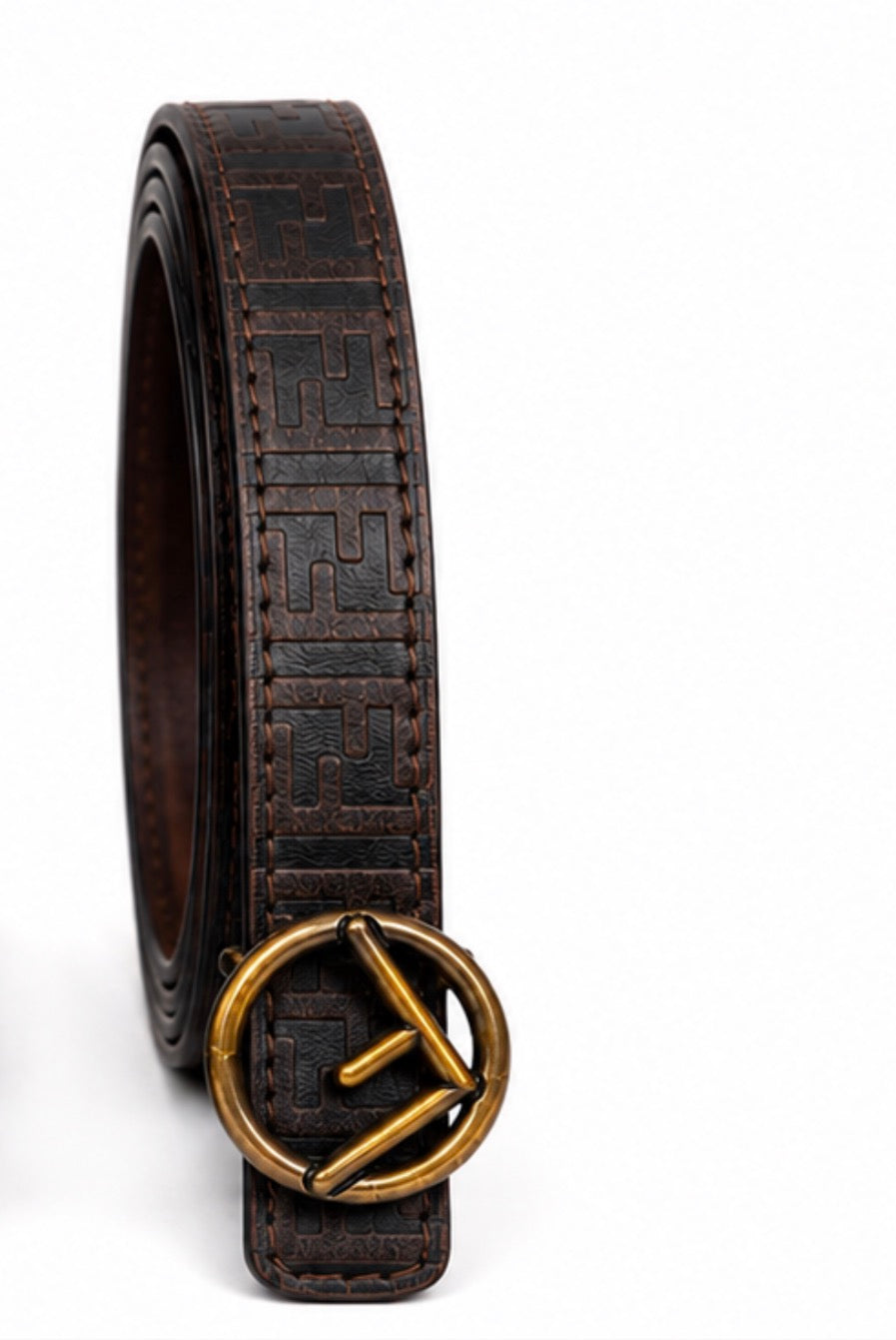 Black and brown textured women’s belts with embossed detailing and antique gold-tone circular statement buckles.