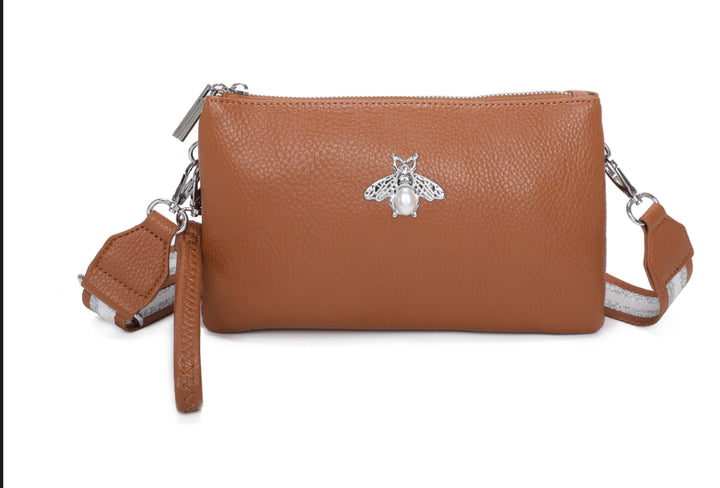 Brown faux leather handbag with a silver bee emblem 