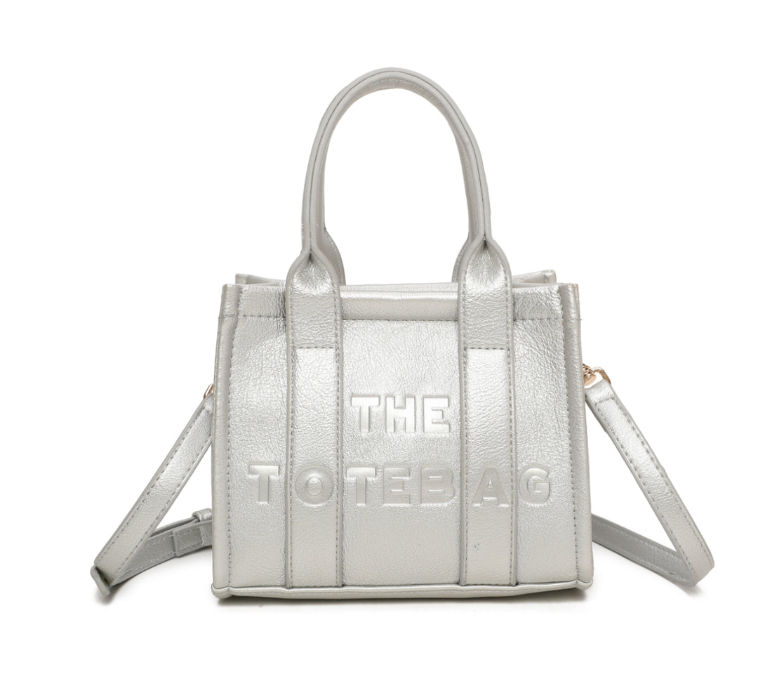 A silver mini tote bag with &