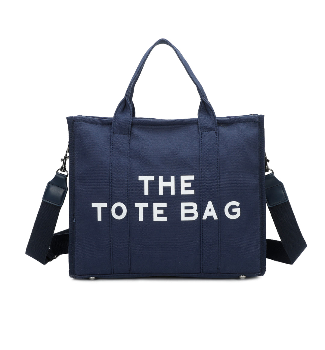 A navy canvas tote bag with &
