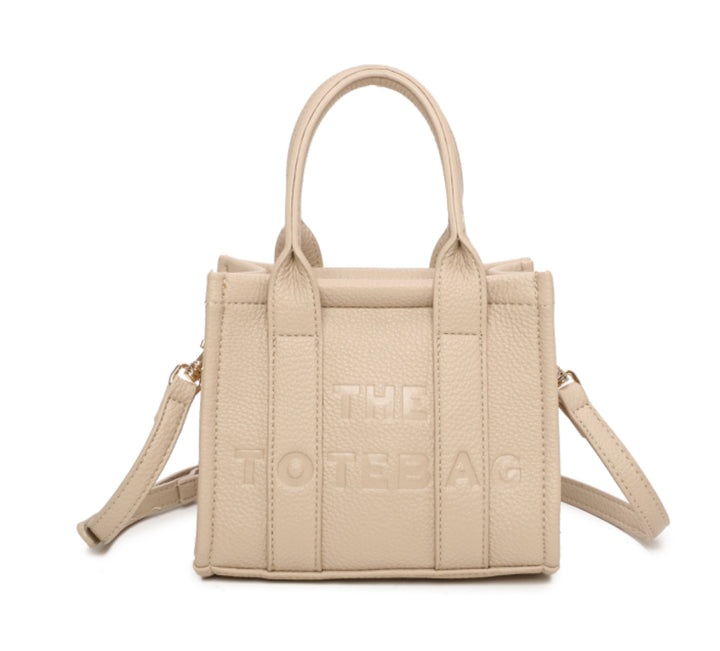 A beige mini tote bag with &