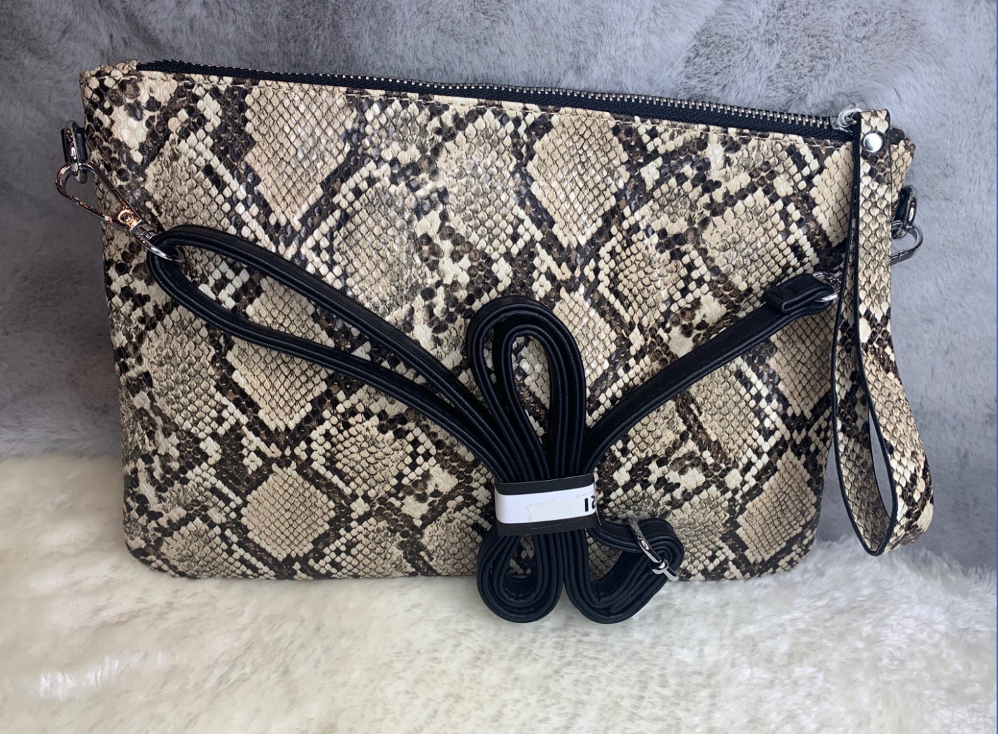 Snake print Clutch bag