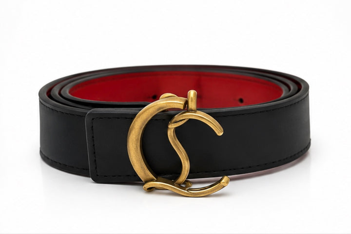 Black statement belt with interchangeable gold-tone and silver-tone curved buckles and red inner detail