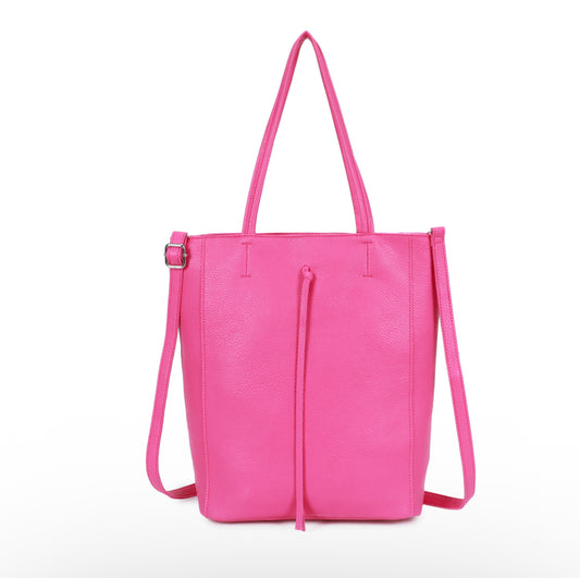 Pink tote bag with shoulder strap on a white background