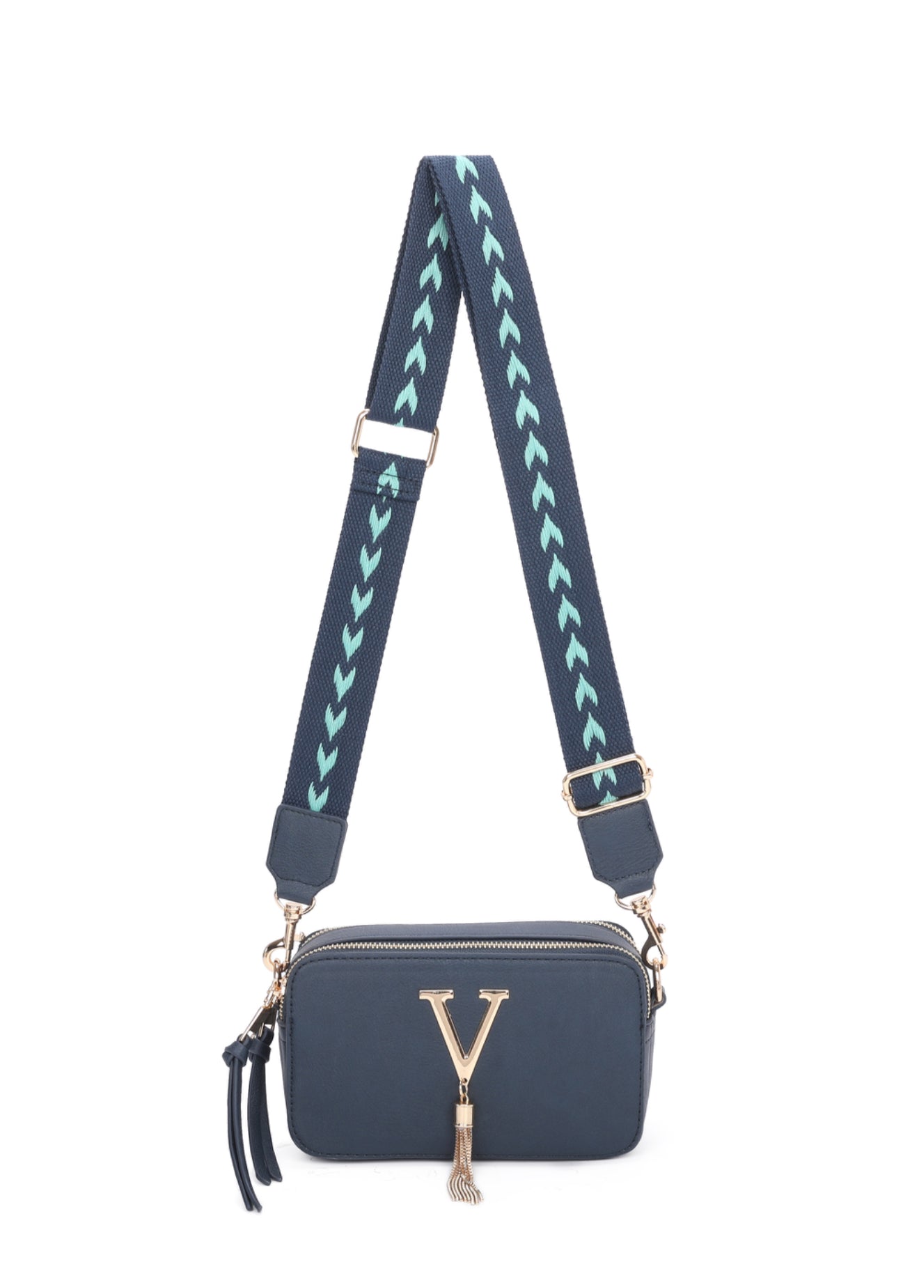 A navy crossbody bag with intricate gold detailing and a adjustable strap.