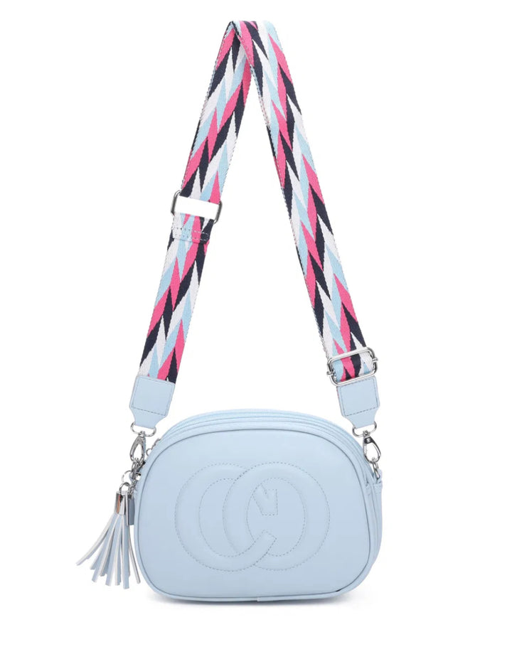 A animal patterned strap cross body bag with a detachable and adjustable strap, featuring multiple zipped compartments and golden tone metal hardware.