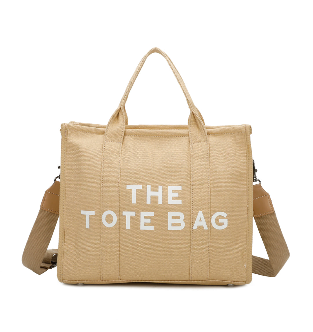 A beige canvas tote bag with &