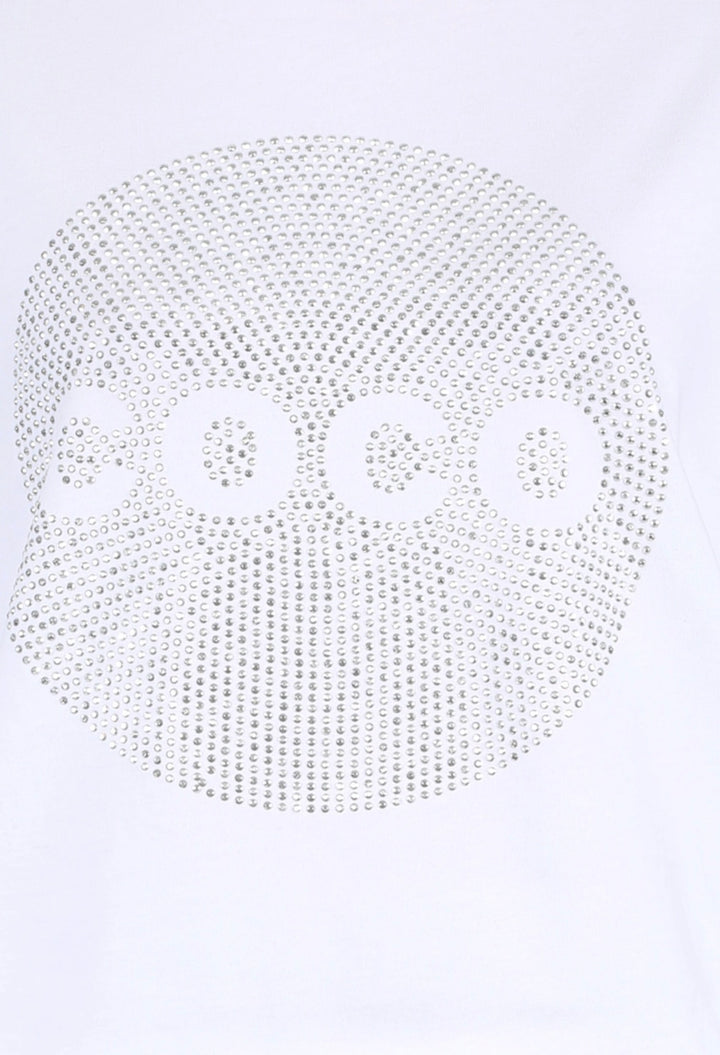     Close-up of circular rhinestone COCO design