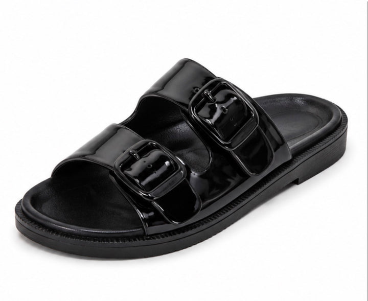 A single black double-strap slide sandal with a glossy patent finish and matching black sole, shown on a plain white background.