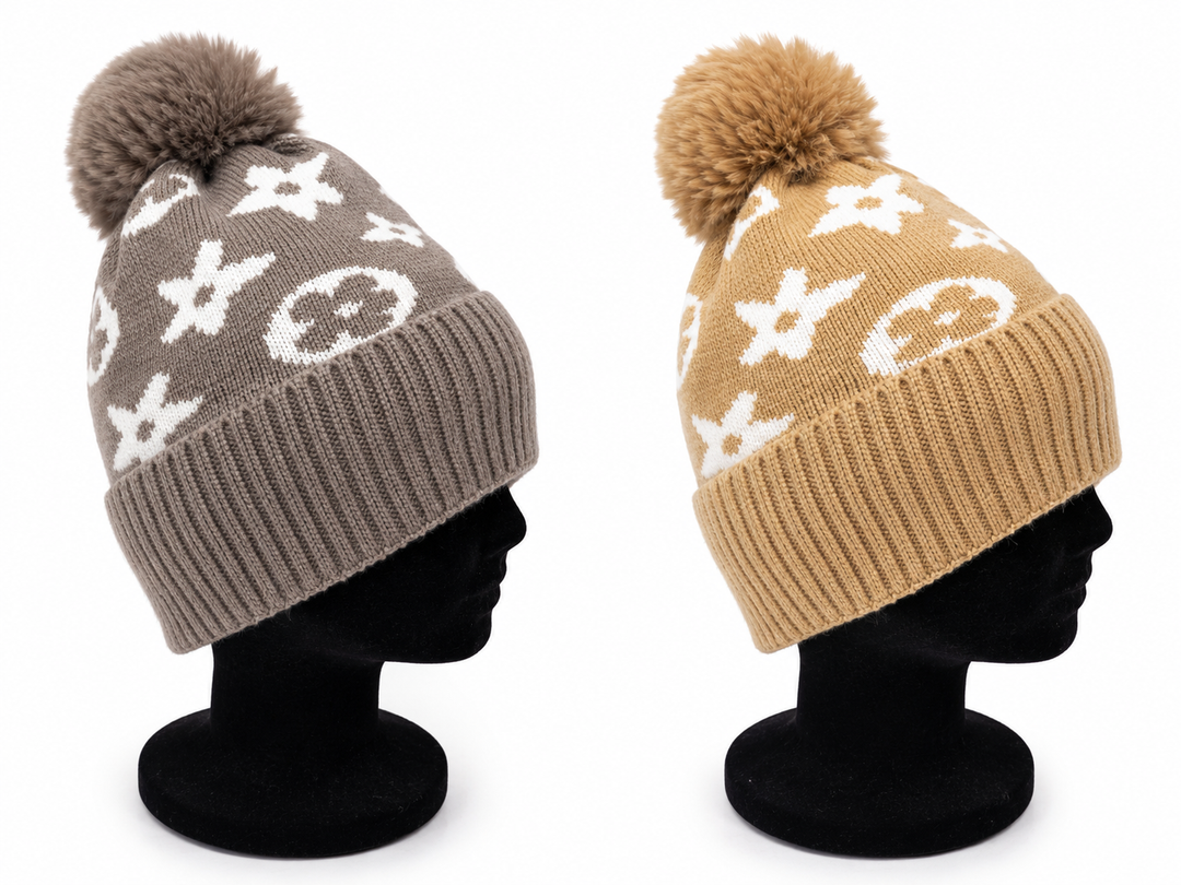 Luxury knitted pom pom winter hat with contrasting monogram-inspired print and ribbed cuff in grey and camel