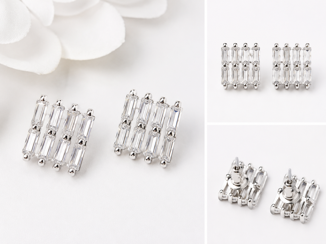 Silver rectangular stud earrings featuring rows of clear baguette-cut crystals