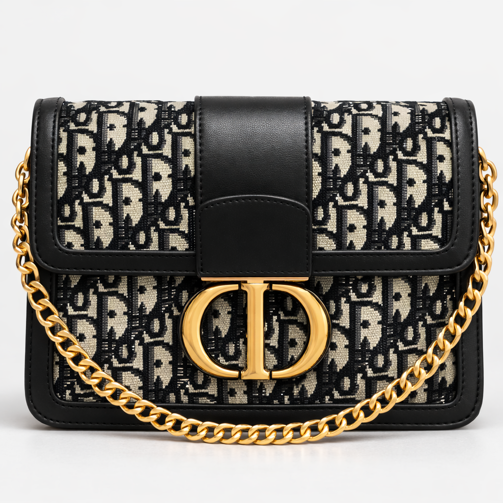 Designer handbag with black and beige pattern and gold chain strap