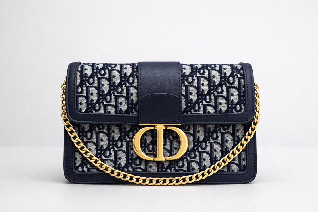 Designer handbag with gold chain and gold buckle 
