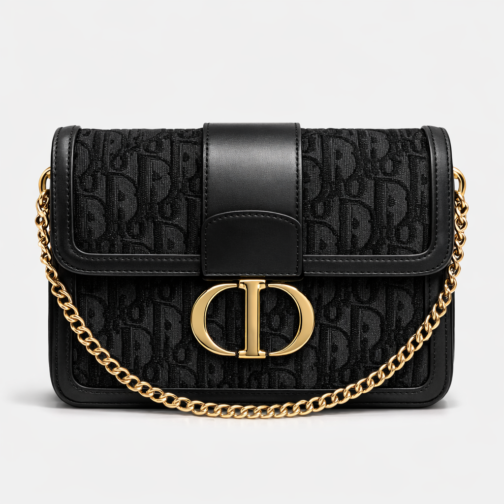 Black handbag with gold chain and gold buckle 