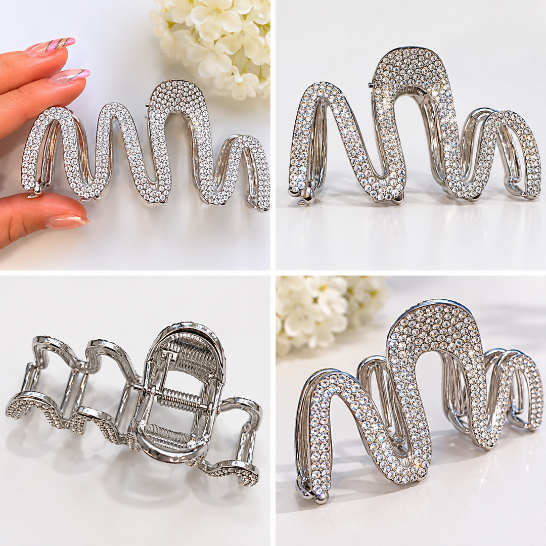 Silver crystal wave hair claw clip featuring sparkling rhinestone detailing and a strong claw grip fastening.