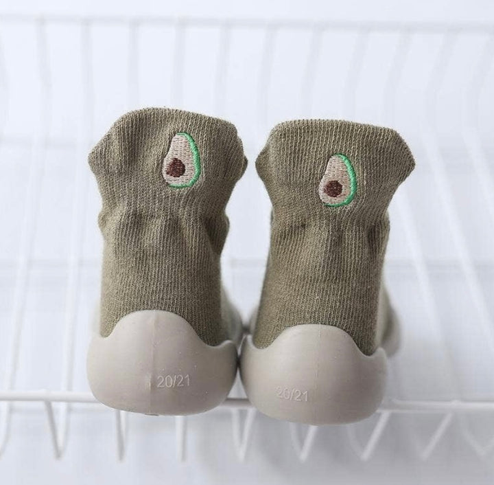 green sock trainers with stitched avocado detail on the back 